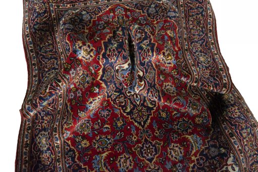 Surface texture of 2000s Kashan rug with natural Wool and intricate pattern