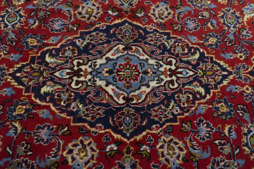 Central medallion detail of 2000s Kashan rug from Iran / Persia