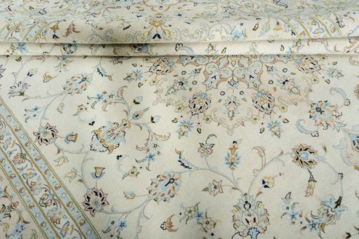 Close-up detail of New Kashan rug from Iran / Persia showing Wool weave