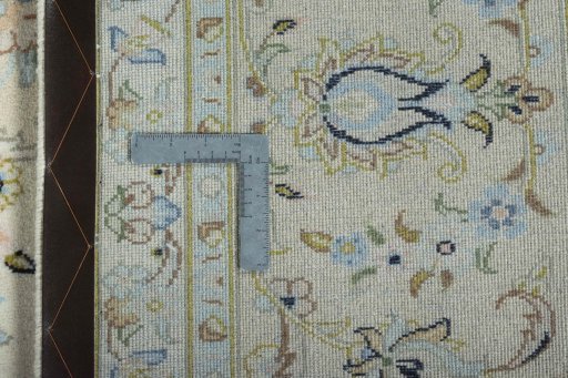 Backside of handmade New Kashan rug showing knot structure and weave density