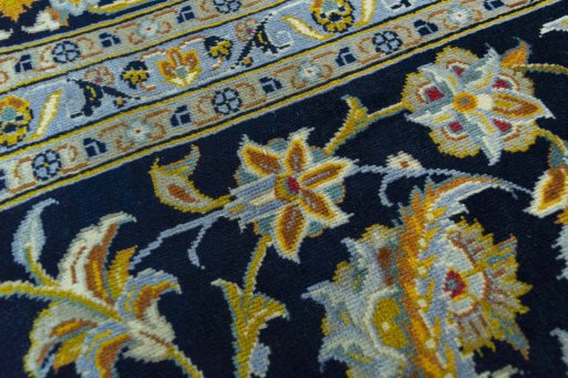 Central medallion detail of 2000s Kashan rug from Iran / Persia