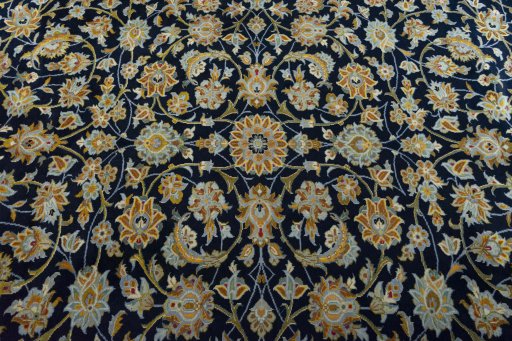 Central medallion detail of 2000s Kashan rug from Iran / Persia