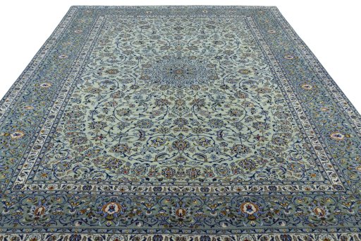 Surface texture of 2000s Kashan rug with natural Wool and intricate pattern