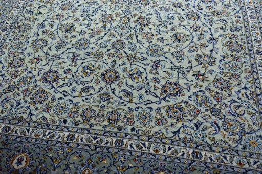Close-up detail of 2000s Kashan rug from Iran / Persia showing Wool weave