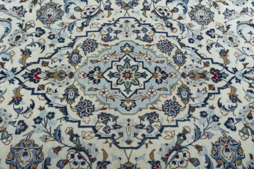Central medallion detail of 2000s Kashan rug from Iran / Persia