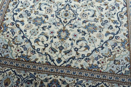 Close-up detail of 2000s Kashan rug from Iran / Persia showing Wool weave