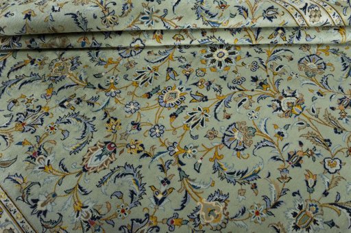 Close-up detail of 2000s Kashan rug from Iran / Persia showing Wool weave