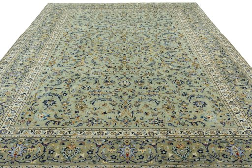 Surface texture of 2000s Kashan rug with natural Wool and intricate pattern