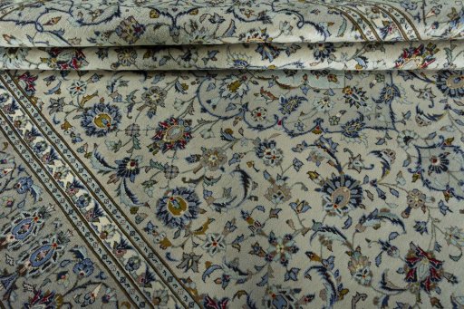 Close-up detail of 2000s Kashan rug from Iran / Persia showing Wool weave
