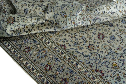 Surface texture of 2000s Kashan rug with natural Wool and intricate pattern