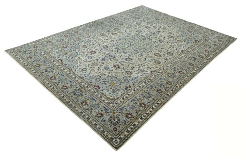 Corner detail of 2000s Kashan rug showing border pattern and Wool pile