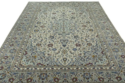 Surface texture of 2000s Kashan rug with natural Wool and intricate pattern