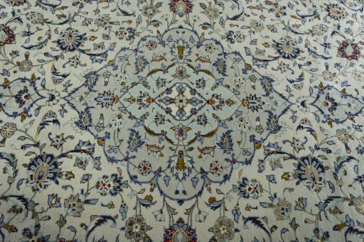 Central medallion detail of 2000s Kashan rug from Iran / Persia
