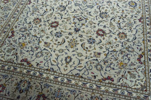 Close-up detail of 2000s Kashan rug from Iran / Persia showing Wool weave