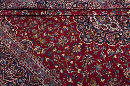 Close-up detail of 1970s Kashan rug from Iran / Persia showing Wool weave