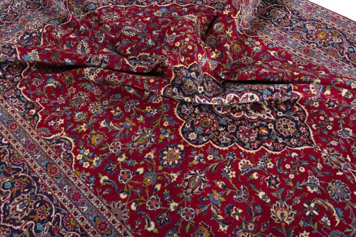 Surface texture of 1970s Kashan rug with natural Wool and intricate pattern