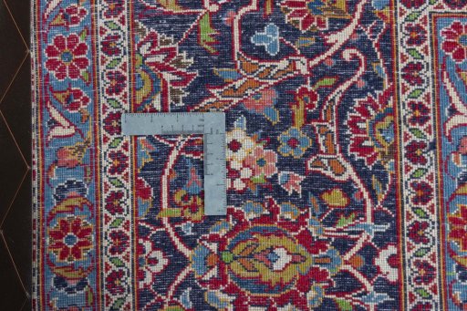 Central medallion detail of 1970s Kashan rug from Iran / Persia