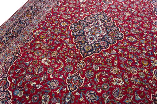 Backside of handmade 1970s Kashan rug showing knot structure and weave density