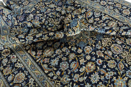 Surface texture of 2000s Kashan rug with natural Wool and intricate pattern