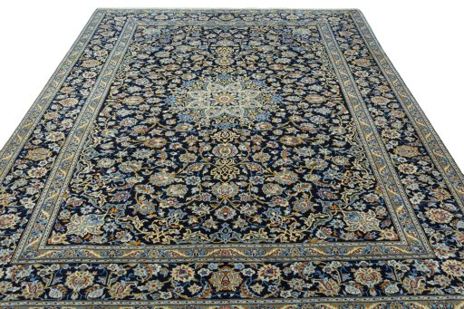 Surface texture of 2000s Kashan rug with natural Wool and intricate pattern