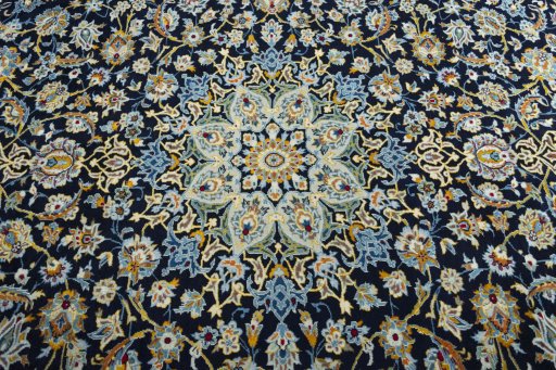 Central medallion detail of 2000s Kashan rug from Iran / Persia
