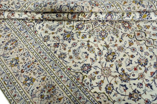 Close-up detail of 2000s Kashan rug from Iran / Persia showing Wool weave