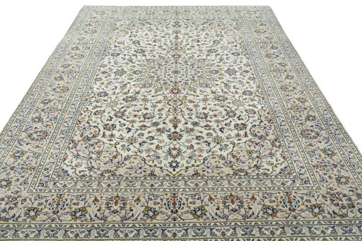 Surface texture of 2000s Kashan rug with natural Wool and intricate pattern