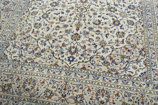 Close-up detail of 2000s Kashan rug from Iran / Persia showing Wool weave
