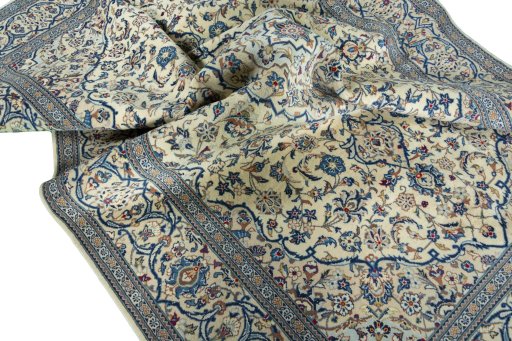 Surface texture of 2000s Kashan rug with natural Wool and intricate pattern