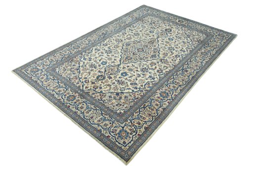 Corner detail of 2000s Kashan rug showing border pattern and Wool pile