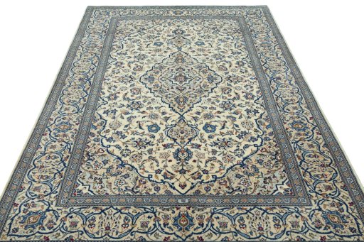 Surface texture of 2000s Kashan rug with natural Wool and intricate pattern