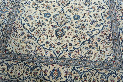 Close-up detail of 2000s Kashan rug from Iran / Persia showing Wool weave