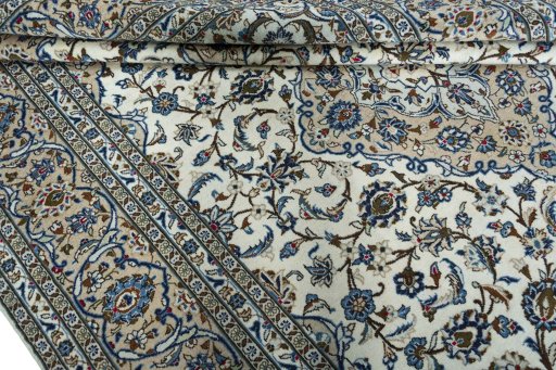 Close-up detail of 2000s Kashan rug from Iran / Persia showing Wool weave
