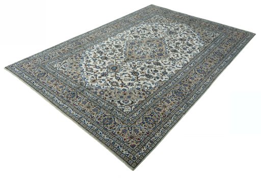Corner detail of 2000s Kashan rug showing border pattern and Wool pile