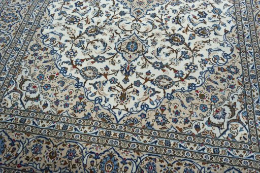 Close-up detail of 2000s Kashan rug from Iran / Persia showing Wool weave