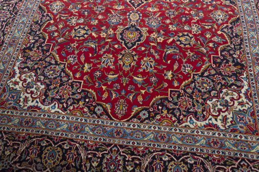 Close-up detail of 2000s Kashan rug from Iran / Persia showing Wool weave