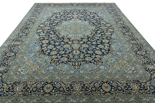 Surface texture of 2000s Kashan rug with natural Wool and intricate pattern
