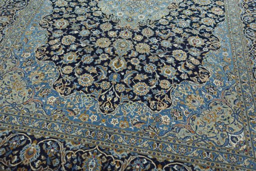 Close-up detail of 2000s Kashan rug from Iran / Persia showing Wool weave
