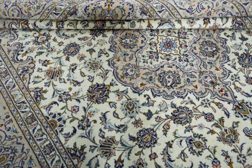 Close-up detail of 2000s Kashan rug from Iran / Persia showing Wool weave