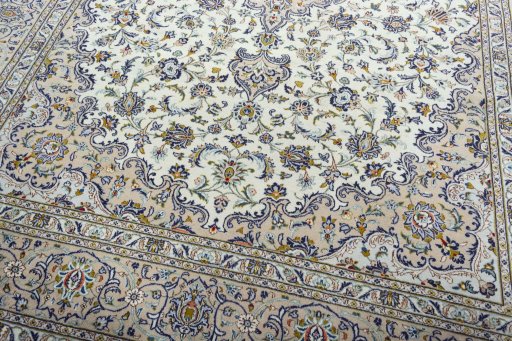 Close-up detail of 2000s Kashan rug from Iran / Persia showing Wool weave