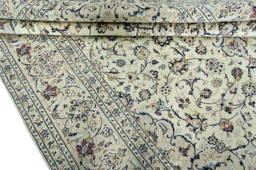 Close-up detail of 2000s Kashan rug from Iran / Persia showing Wool weave