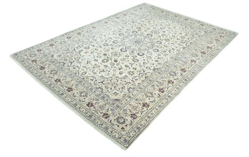Corner detail of 2000s Kashan rug showing border pattern and Wool pile