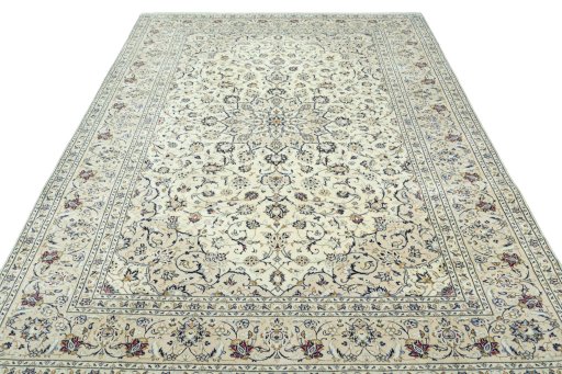 Surface texture of 2000s Kashan rug with natural Wool and intricate pattern