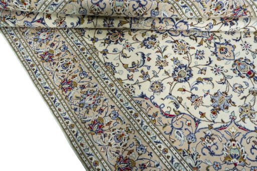Close-up detail of 2000s Kashan rug from Iran / Persia showing Wool weave