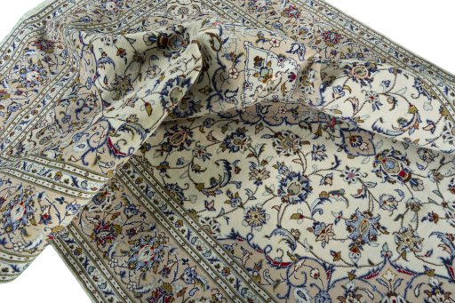 Surface texture of 2000s Kashan rug with natural Wool and intricate pattern