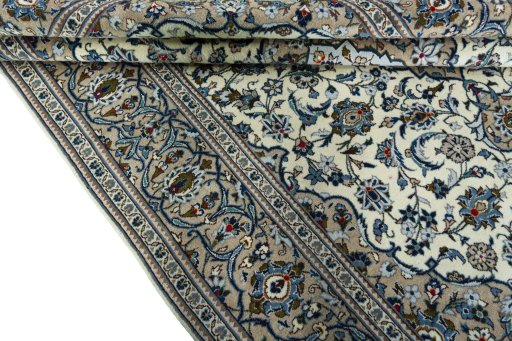 Close-up detail of 2000s Kashan rug from Iran / Persia showing Wool weave