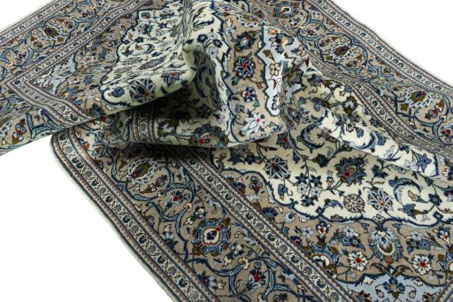 Surface texture of 2000s Kashan rug with natural Wool and intricate pattern