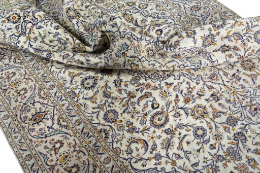 Surface texture of 2000s Kashan rug with natural Cork and intricate pattern