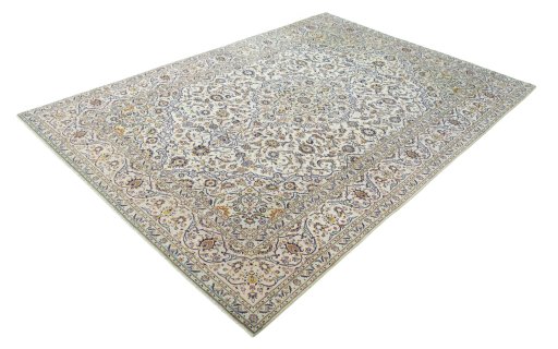 Corner detail of 2000s Kashan rug showing border pattern and Cork pile
