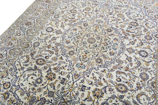 Backside of handmade 2000s Kashan rug showing knot structure and weave density